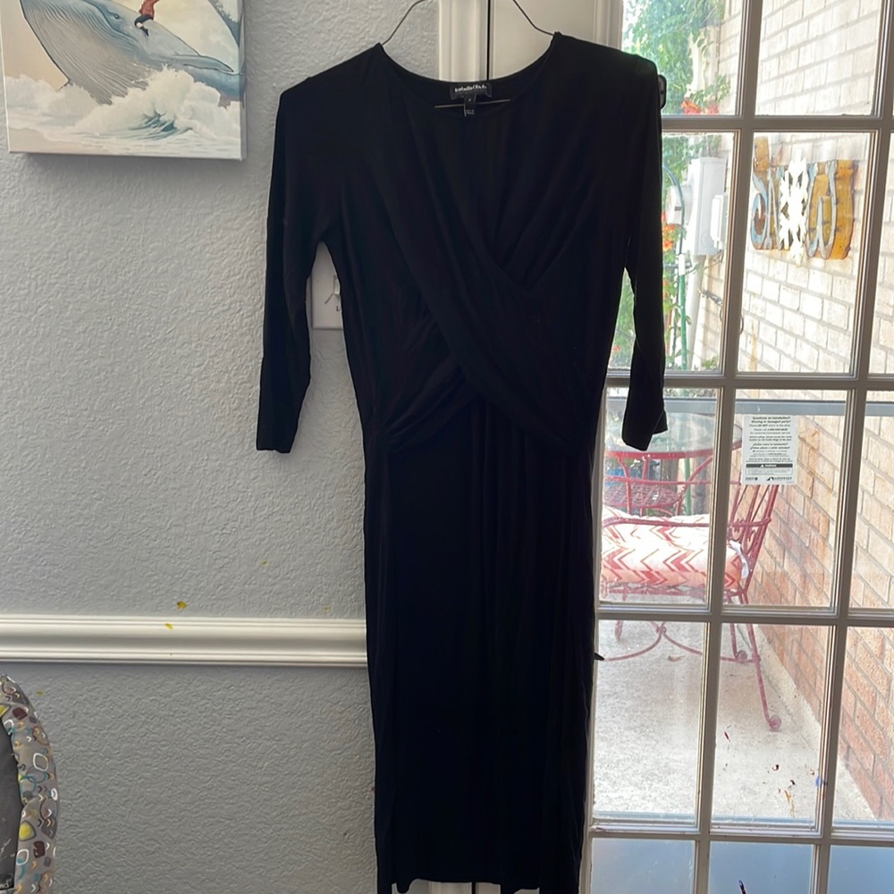 Maternity dress in black from orange in pod.  Can be very formal or casual